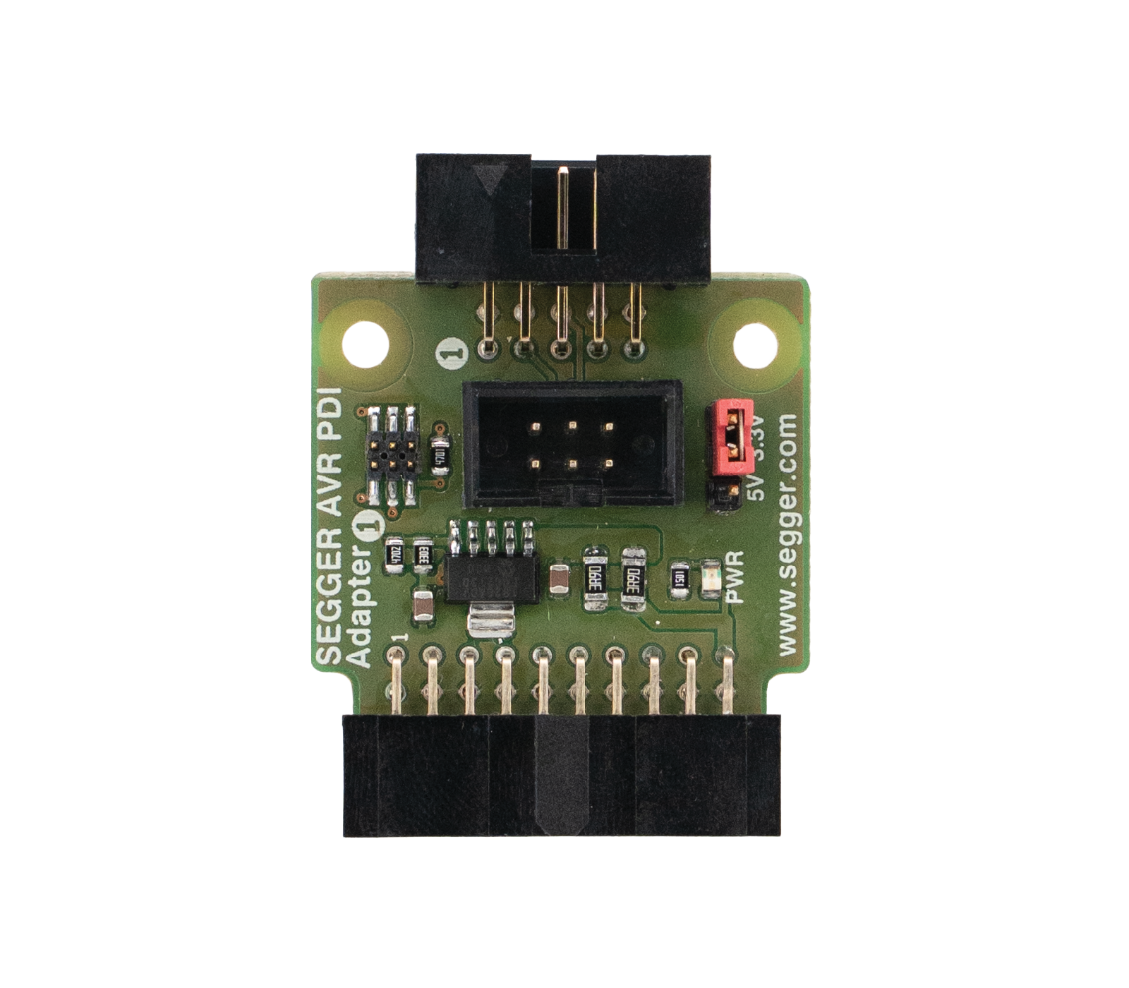 A green printed circuit board adapter labeled "SEGGAR AVR PDI" with multiple pins for connections. It features a central black connector, a red power jumper, and several small electronic components. The adapter is designed for programming AVR microcontrollers.